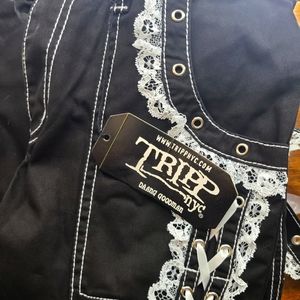 Size 27/5 Black and white Lolita Tripp pants.